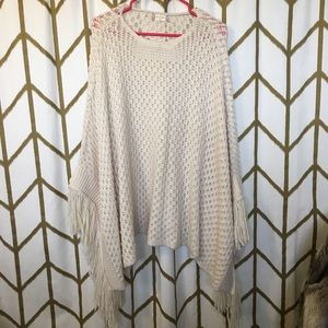One size fits all cream poncho